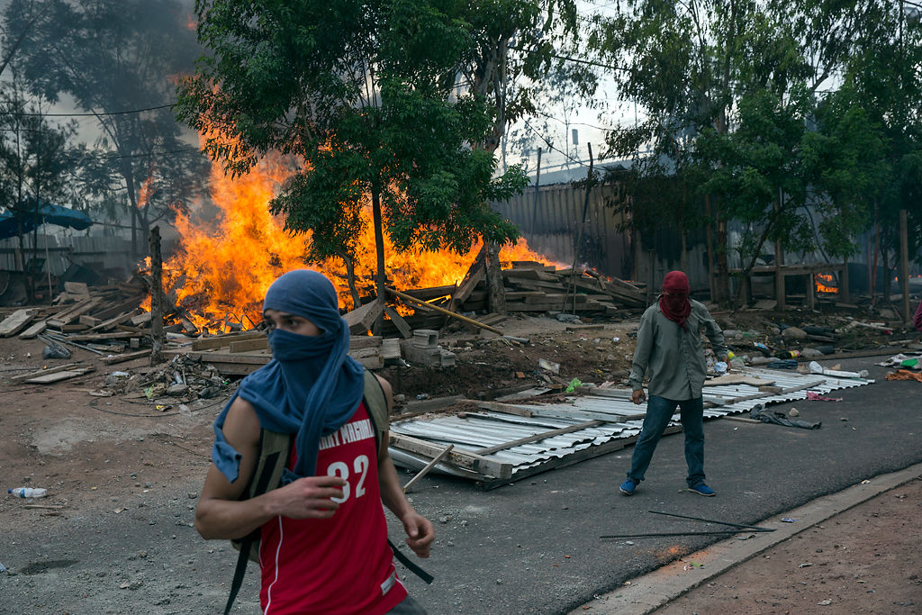 Supporters of opposition presidential candidate Salvador Nasralla clash with security forces